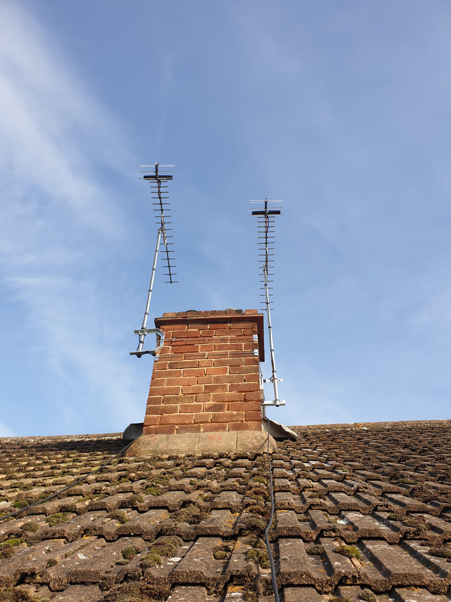 Neighbours both had their aerials done at the same time on the same chimney stack